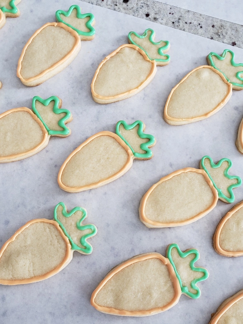 Cookies outlined with royal icing