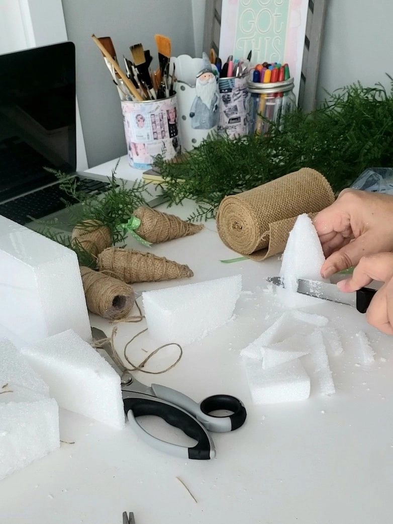 Cutting foam pieces into carrot shapes