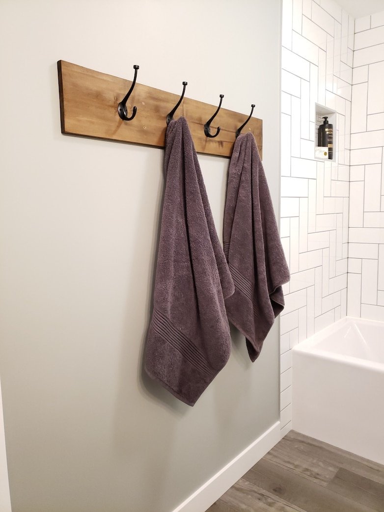 Custom towel hooks in the basement bathroom