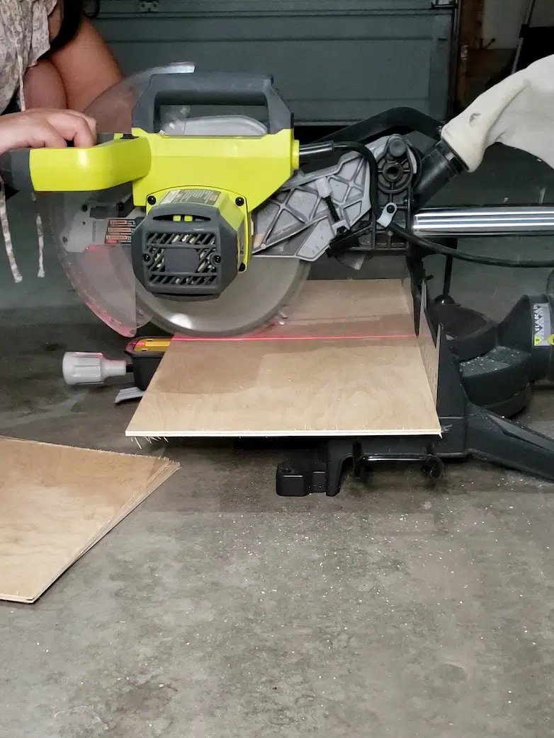 Cutting pieces of plywood