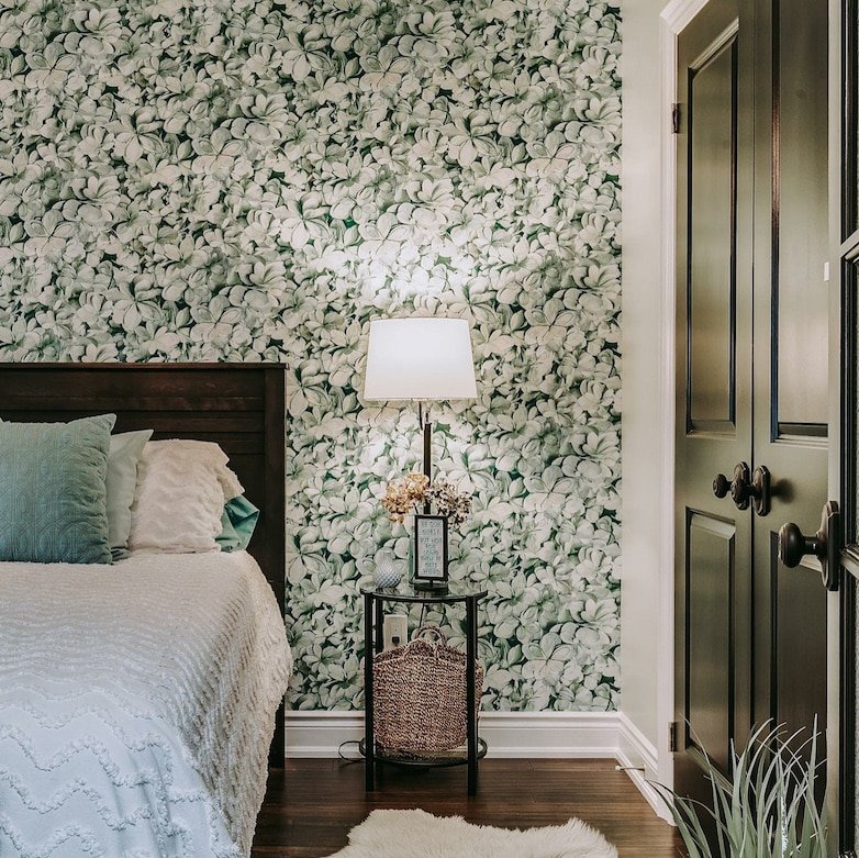 Bedroom with green wallpaper