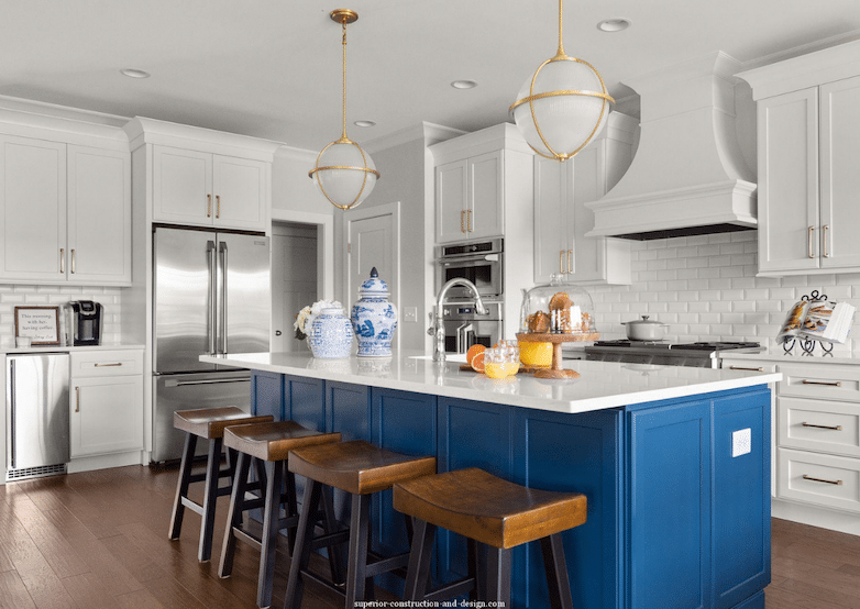 White kitchen with blue island