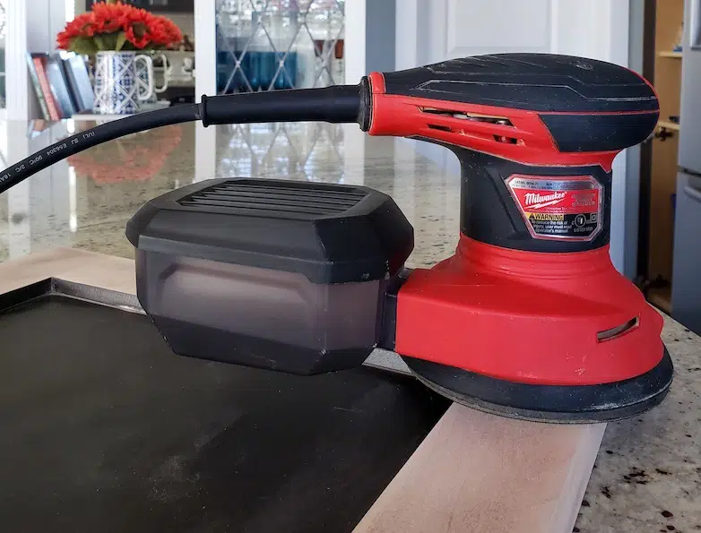 Milwakee orbital sander to prep cabinets for painting
