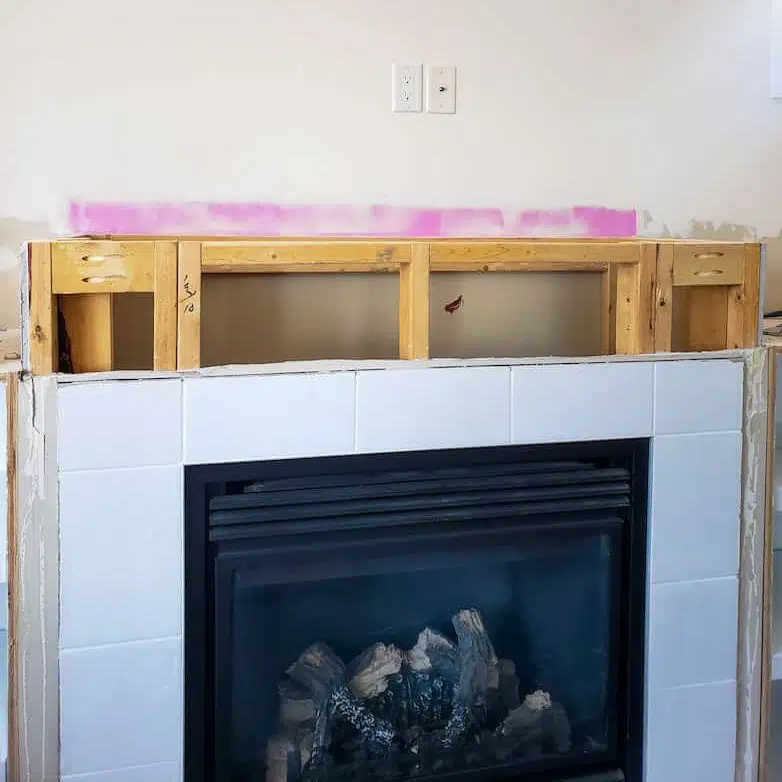 new reinforced frame over the fireplace 