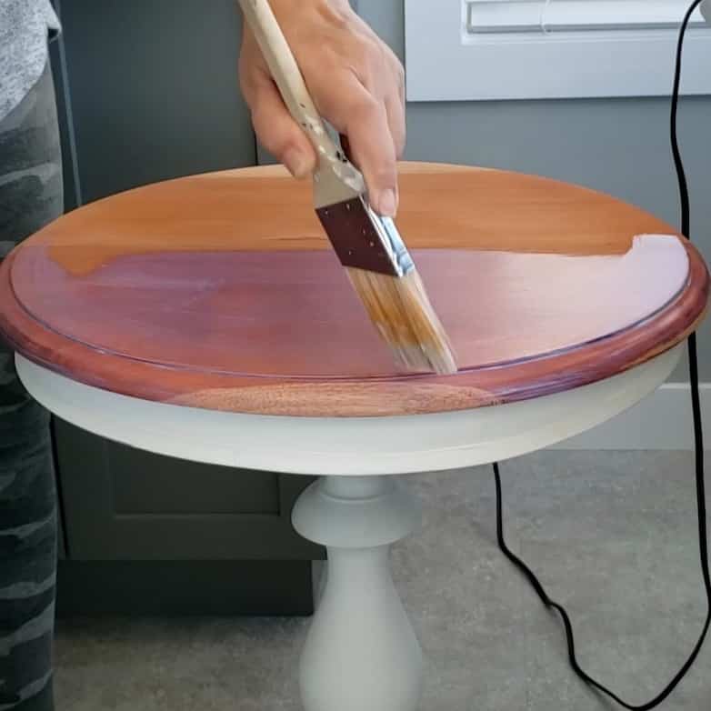 applying a clear coat sealer to the end table's top