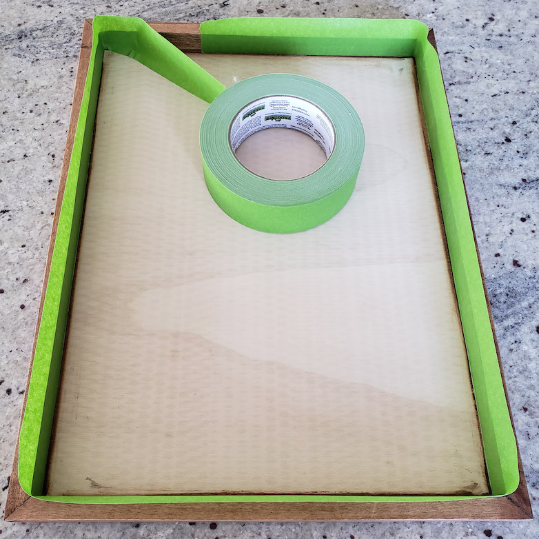 Wooden tray with taped off edges