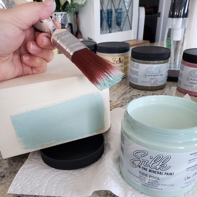 Painting a wooden box with a light sea-green color