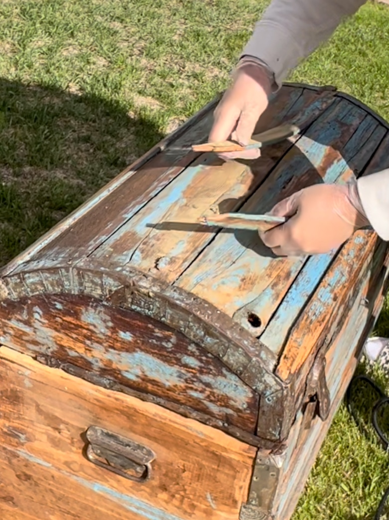 Removing broken slats from a vintage trunk