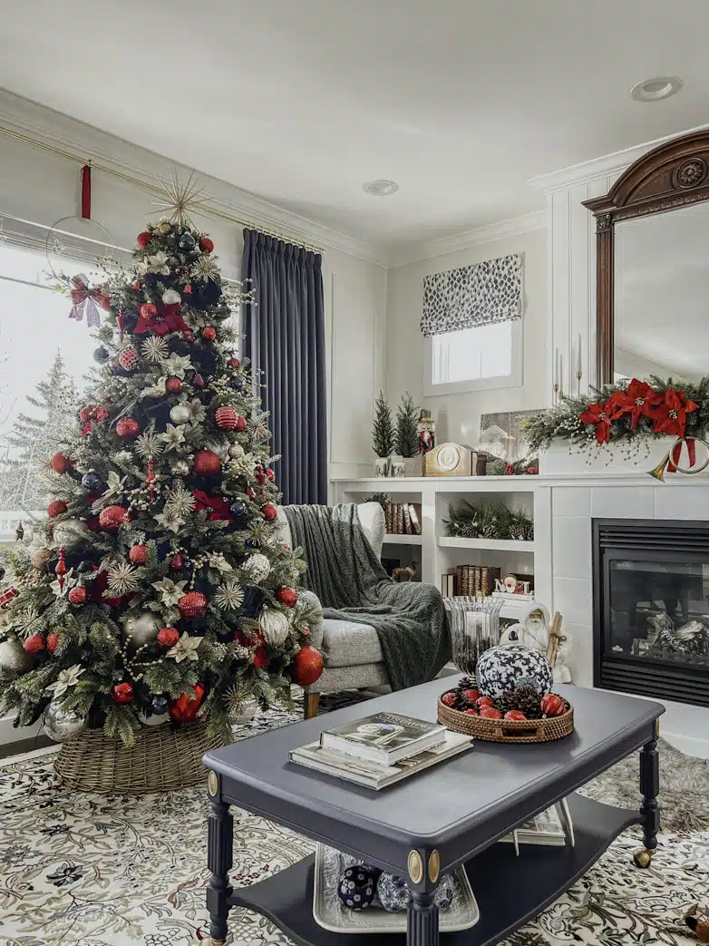 A living room decorated in red and gold for Christmas