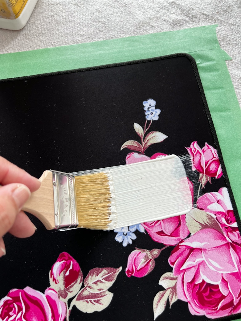 Painting over the fabric of a desk pad or over-sized mouse pad