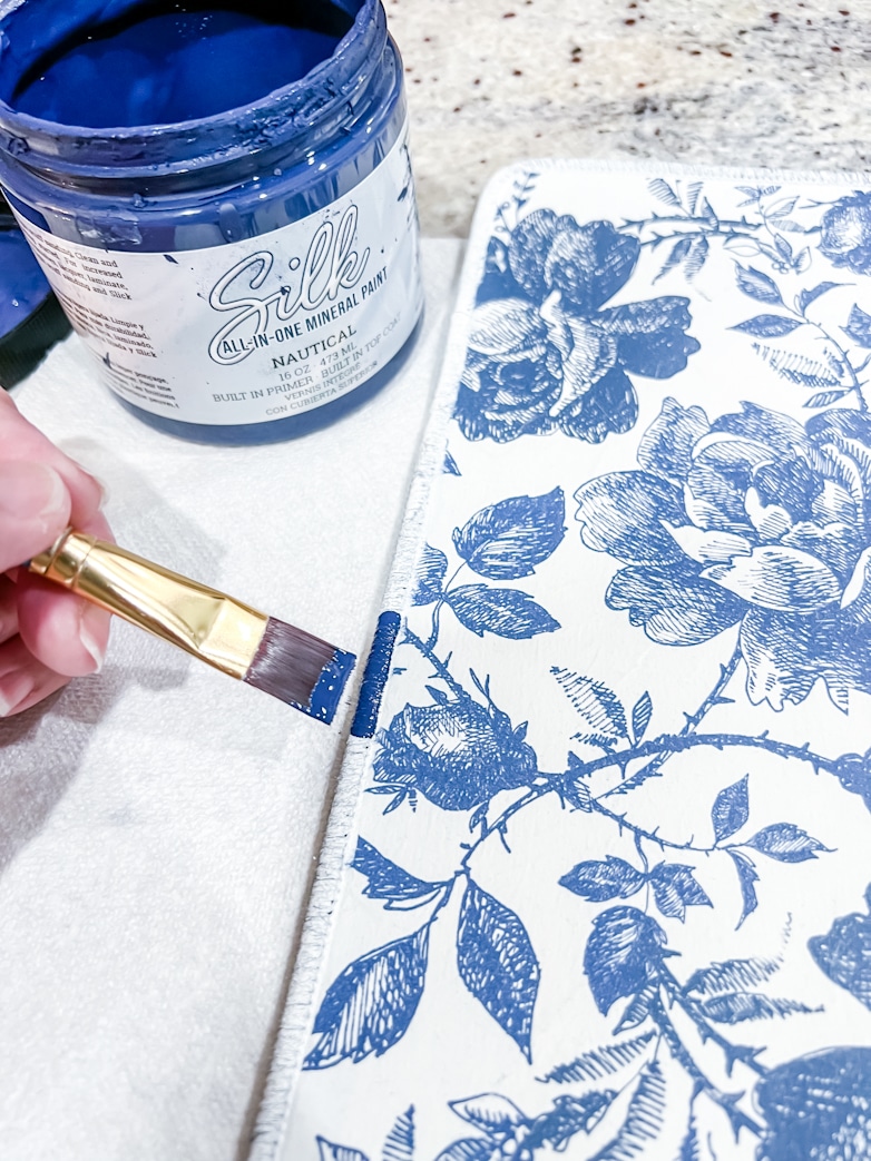 Painting the stitched edges with Nautical Silk Mineral Paint