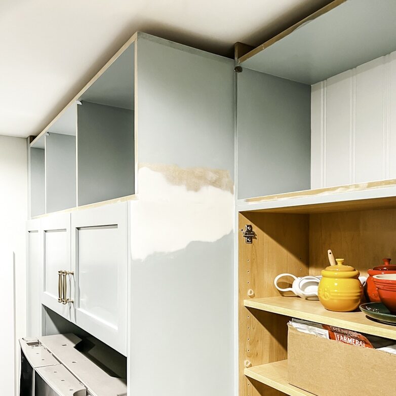 Installing cubbies above kitchen cabinets