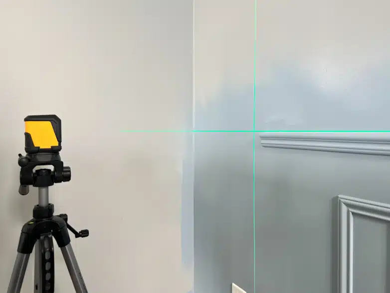 Using a laser level to hang wallpaper straight