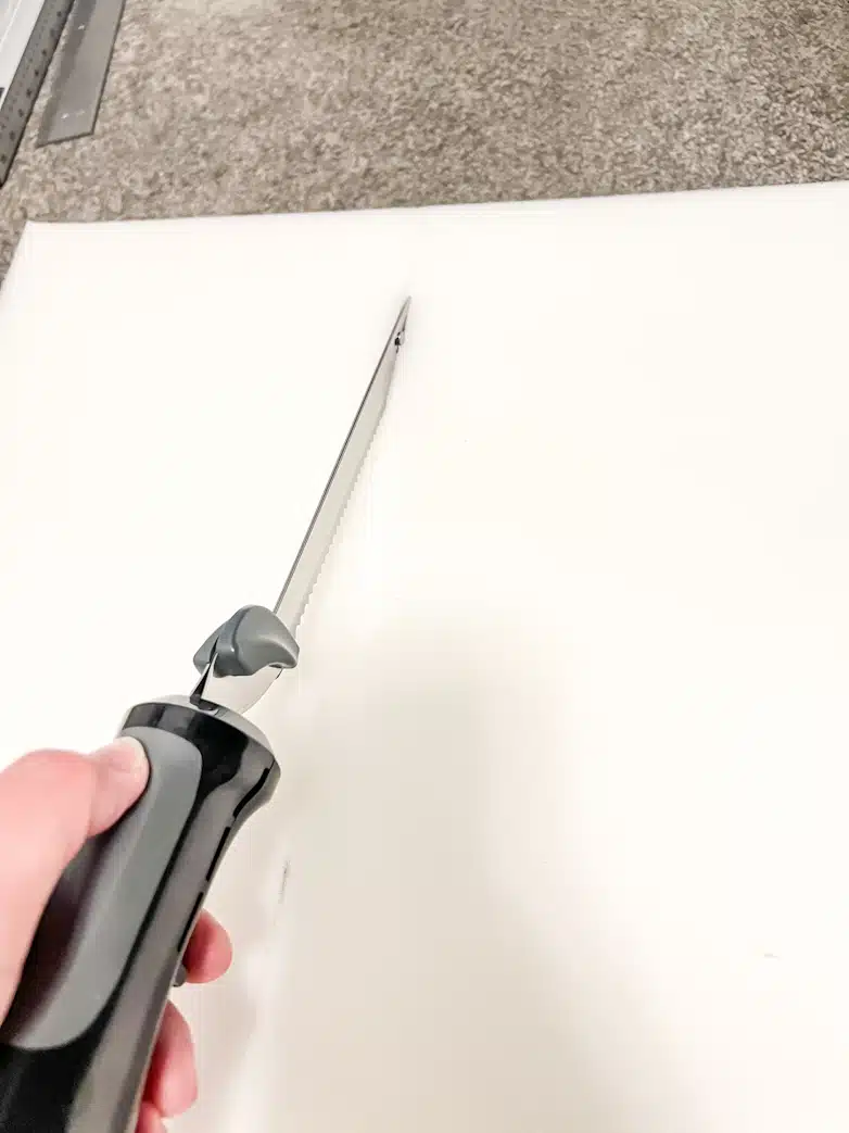 Cutting upholstery foam with an electric carving knife.