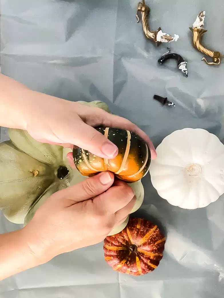 Removing stems from faux pumpkins