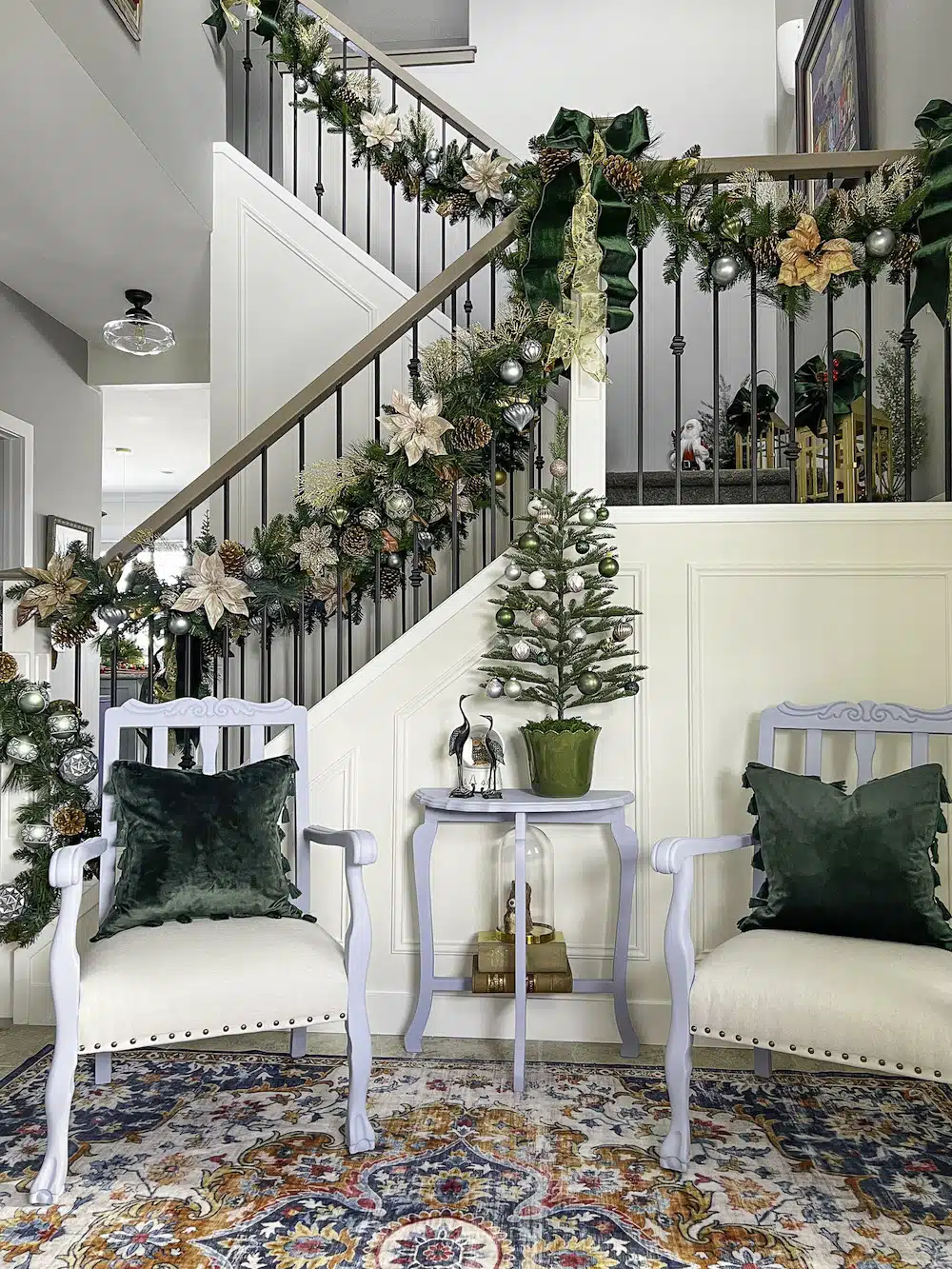 Entryway and stairs decorated for Christmas