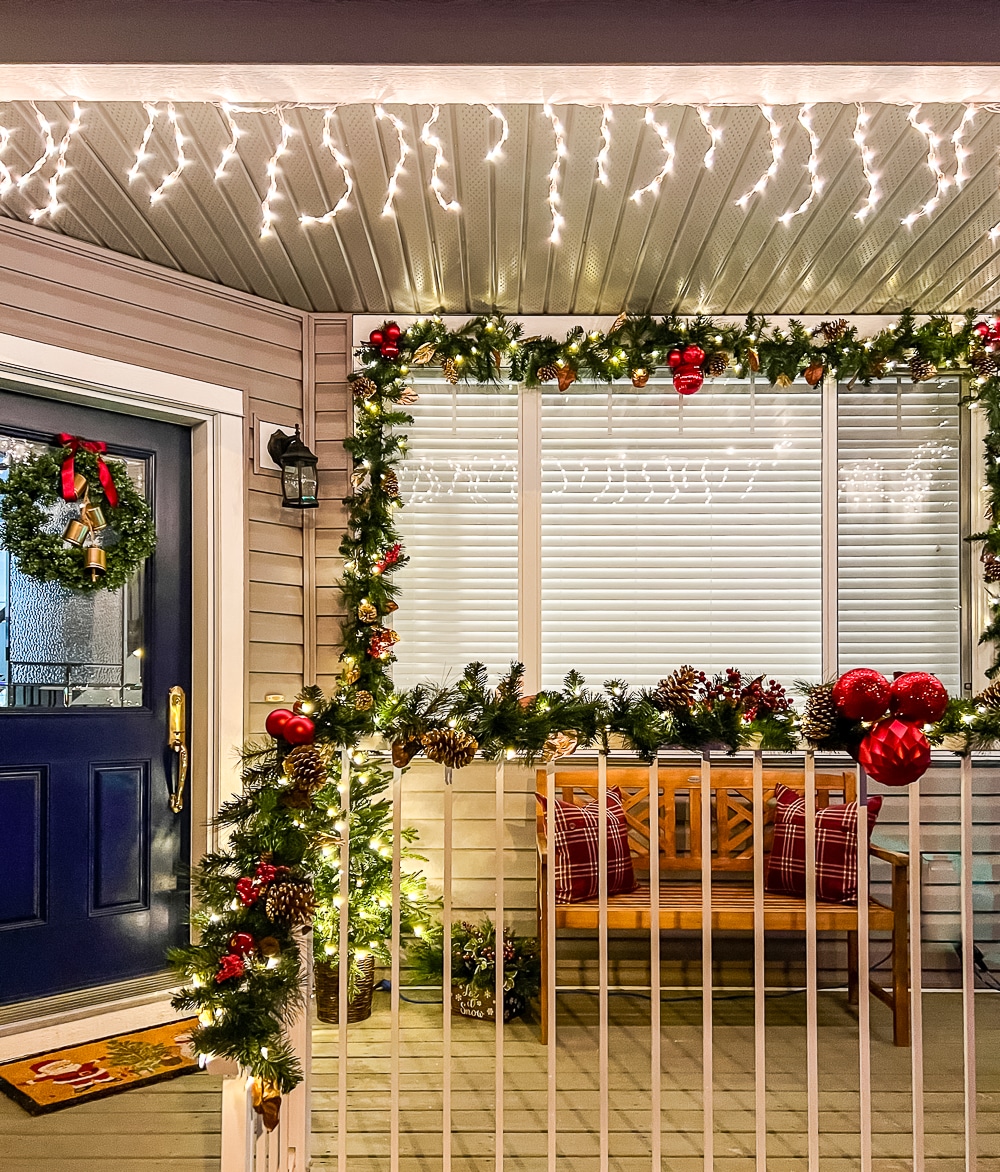 A festive front porch decorated for Christmas