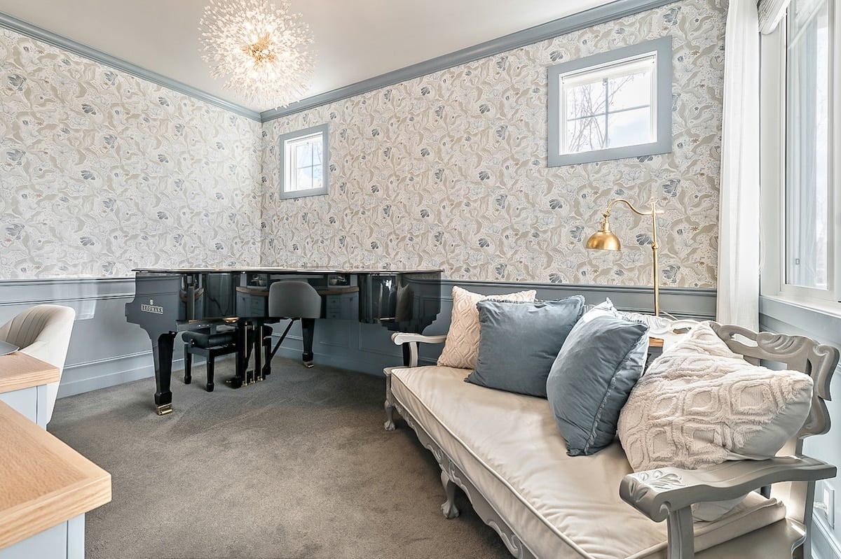 A room with a piano and a couch