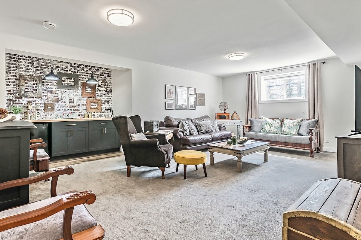 A living room with couches and a table