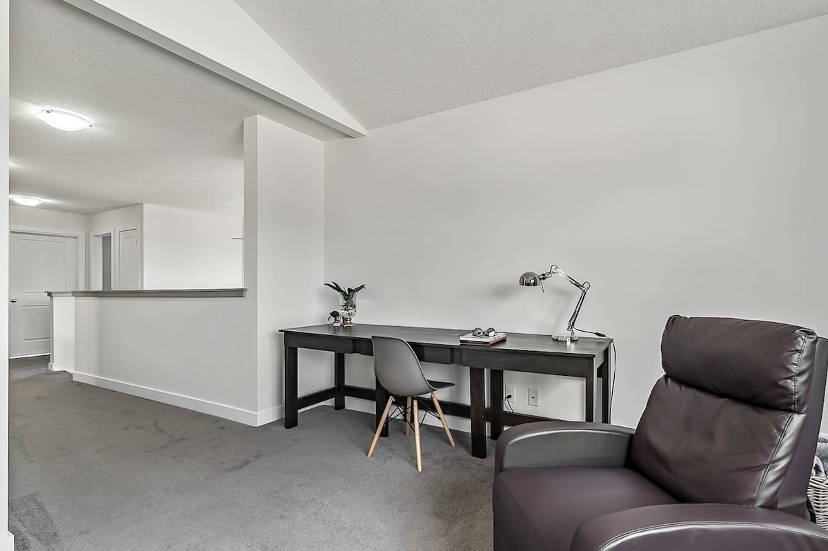 A room with a desk and chair