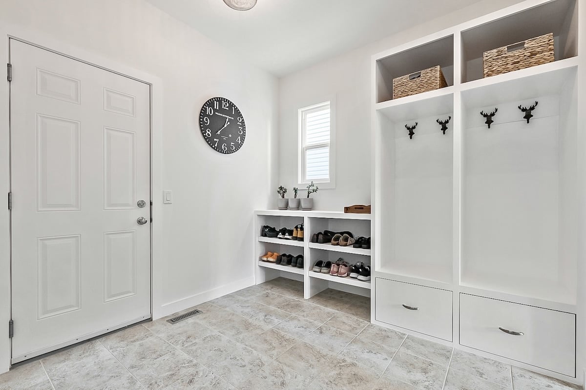 A white room with white walls and white cabinets